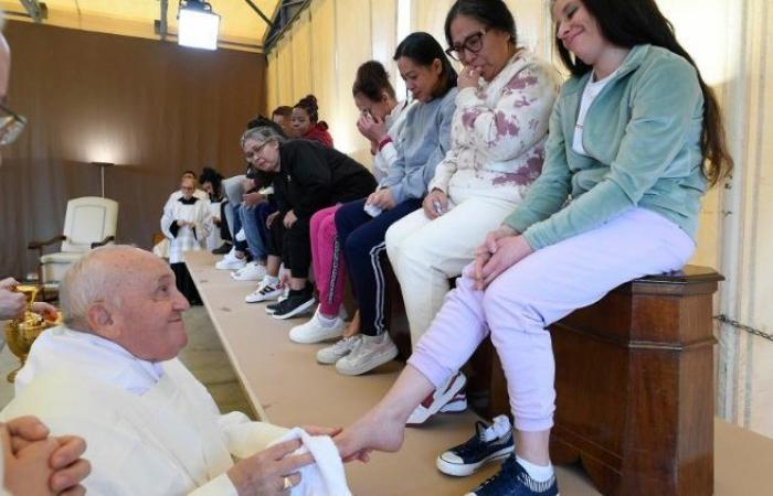 Pope washes the feet of 12 inmates of Rome’s women’s prison, amid much commotion