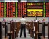 Taiwan stocks close at record high; Asian currencies slump